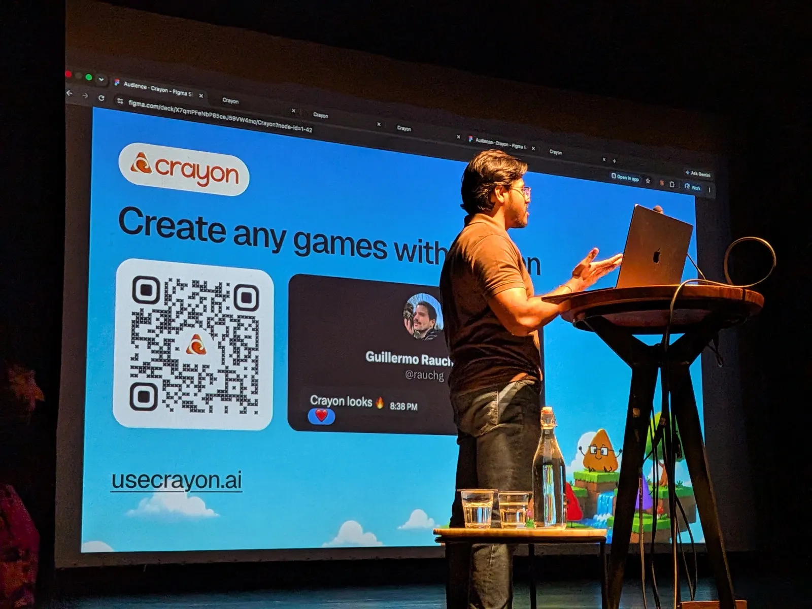 Crayon presenting on stage — slide reads “Create any games with Crayon”, showing a quote from Guillermo Rauch